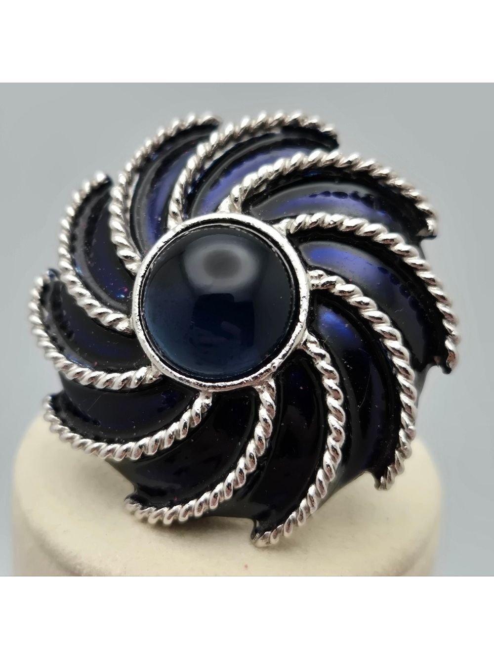 Avon Brooch Navy Blue Enamel Pinwheel Silver Tone Vintage Moonwind Piece
